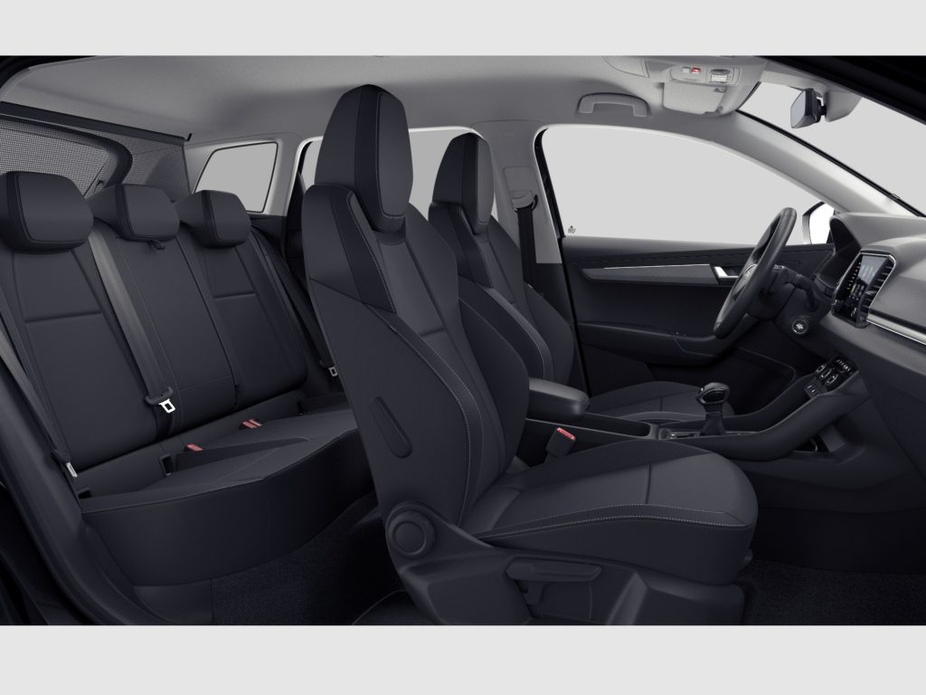 Interior of a modern car showing black leather seats and front dashboard with stitching details