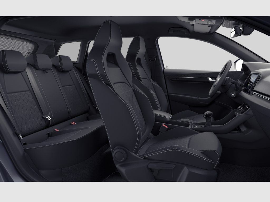 Dark car interior with black stitched seats, front and rear rows visible, sleek dashboard and center console.